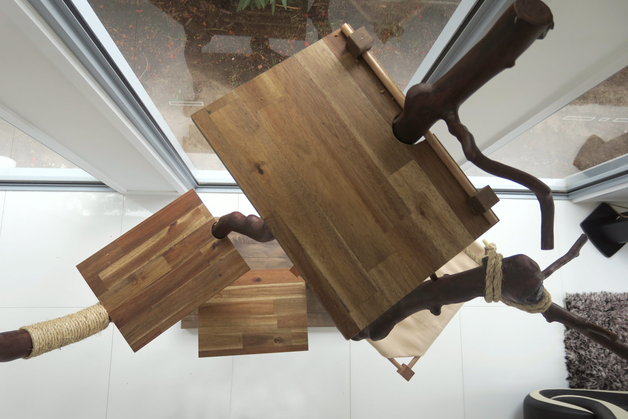 homemade cat tree constructed entirely from wood and glue